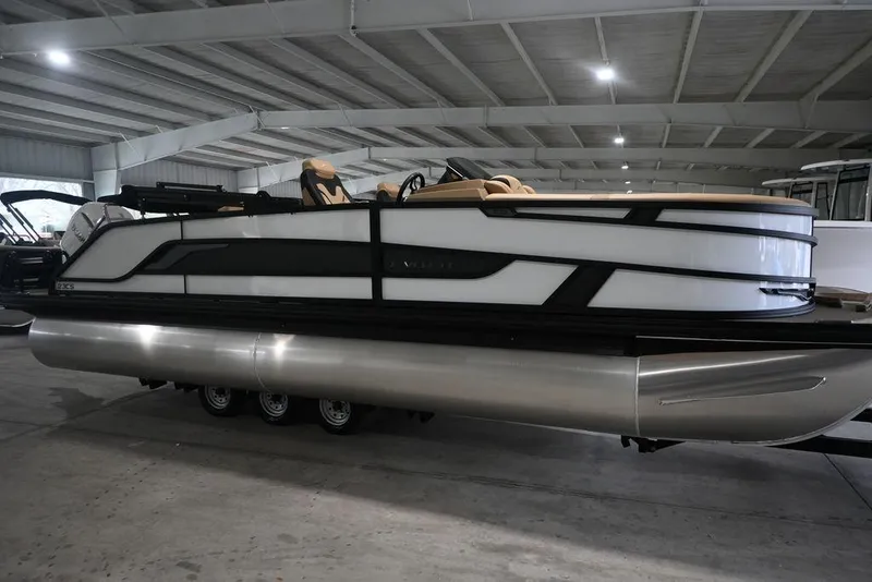 The Image of 2026 Evotti 723CS pontoon boat in a showroom, featuring sleek design and modern amenities. - 0