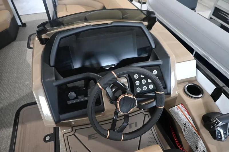 Slide: The Image of Steering console of 2026 Evotti 723CS boat with modern controls and sleek design. - 12