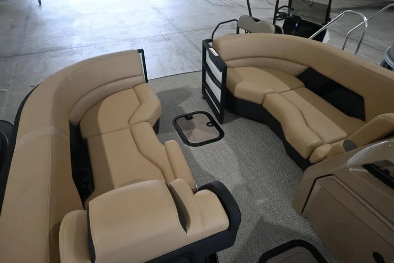 Slide: The Image of Luxurious interior of 2026 Evotti 723CS boat with beige seating and carpeted flooring. - 13