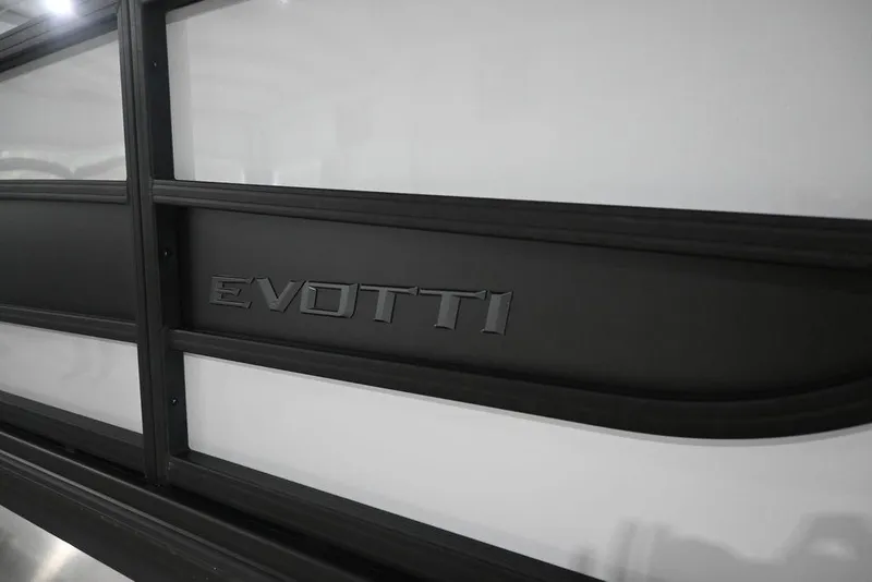 Slide: The Image of Evotti 723CS 2026 model logo on sleek black and white vehicle exterior. - 6