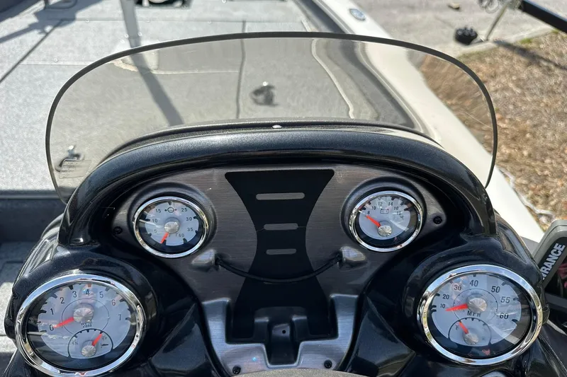 Slide: The Image of Dashboard of 2019 Tracker Pro Team 175 TXW boat with gauges and windshield. - 12