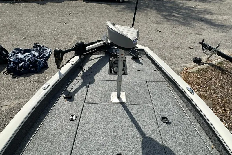 Slide: The Image of 2019 Tracker Pro Team 175 TXW fishing boat deck with seat and trolling motor. - 4