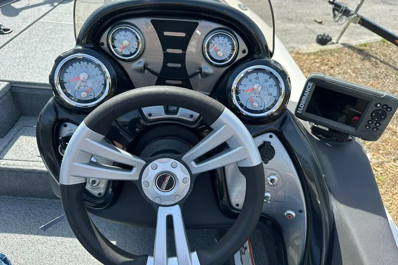 Slide: The Image of 2019 Tracker Pro Team 175 TXW dashboard with steering wheel and gauges. - 8