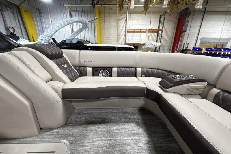 Slide: The Image of Luxurious interior of 2026 Bennington 25 QXSBWASF pontoon boat with plush seating. - 12