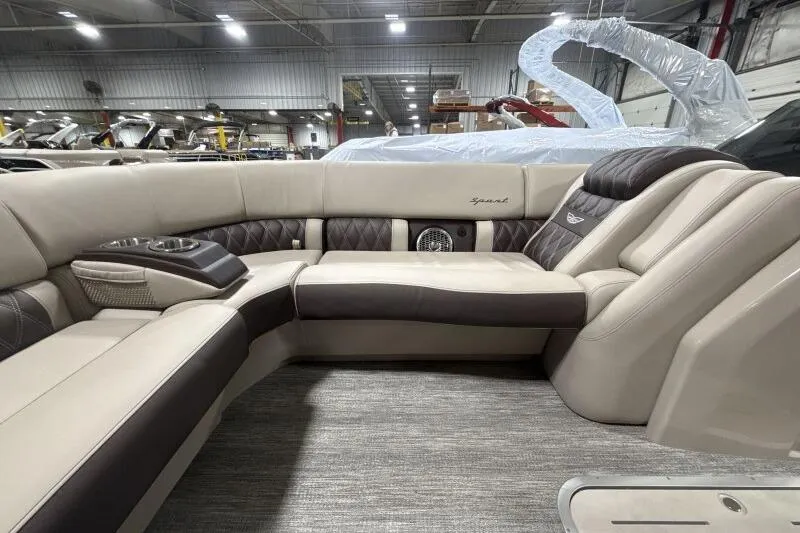Slide: The Image of Luxurious interior of 2026 Bennington 25 QXSBWASF pontoon boat with plush seating. - 14