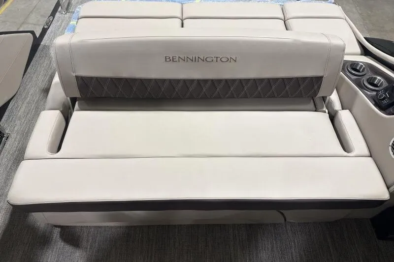Slide: The Image of 2026 Bennington 25 QXSBWASF boat seating with elegant beige upholstery and diamond stitching. - 15