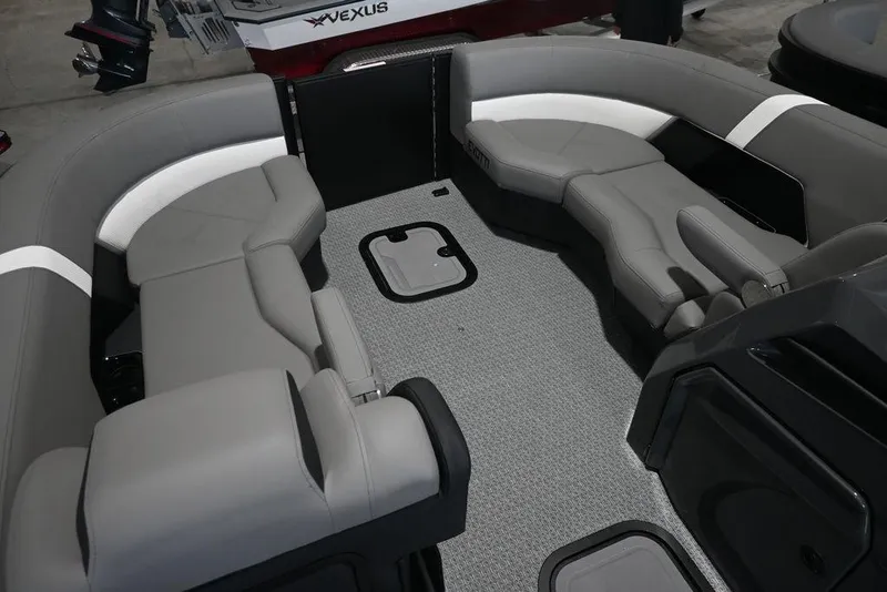 Slide: The Image of Luxurious interior of 2026 Evotti 723QL boat with gray seating and carpeted floor. - 17