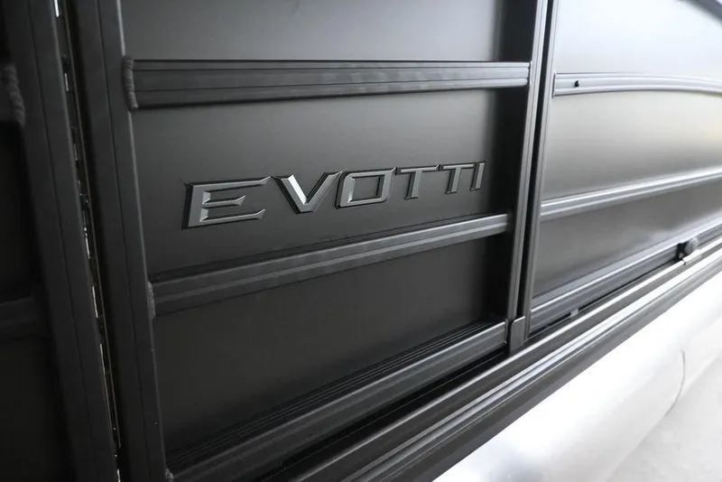 Slide: The Image of 2026 Evotti 723QL vehicle side panel with embossed logo in sleek black finish. - 2