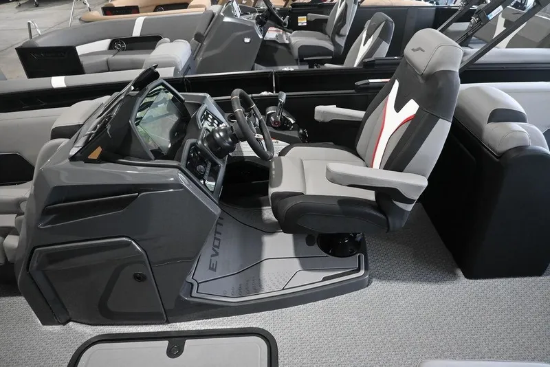 Slide: The Image of Interior of 2026 Evotti 723QL boat, featuring modern helm and comfortable seating. - 5