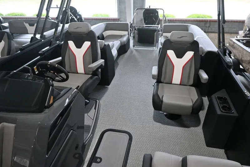 Slide: The Image of Interior of 2026 Evotti 723QL boat with modern seating and steering console. - 6