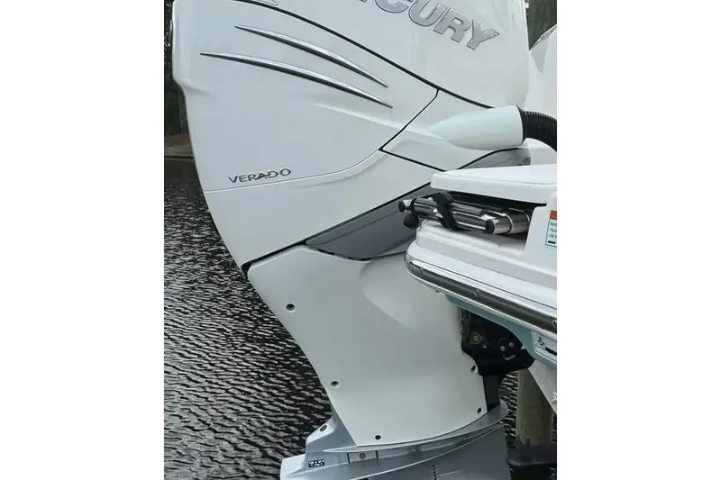 Slide: The Image of 2022 Boston Boatworks Vantage 240 with Mercury Verado outboard engine on water. - 10