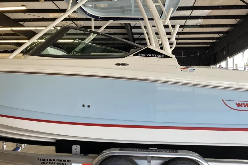Slide: The Image of 2022 Boston Boatworks Vantage 240 on trailer in indoor showroom. - 3