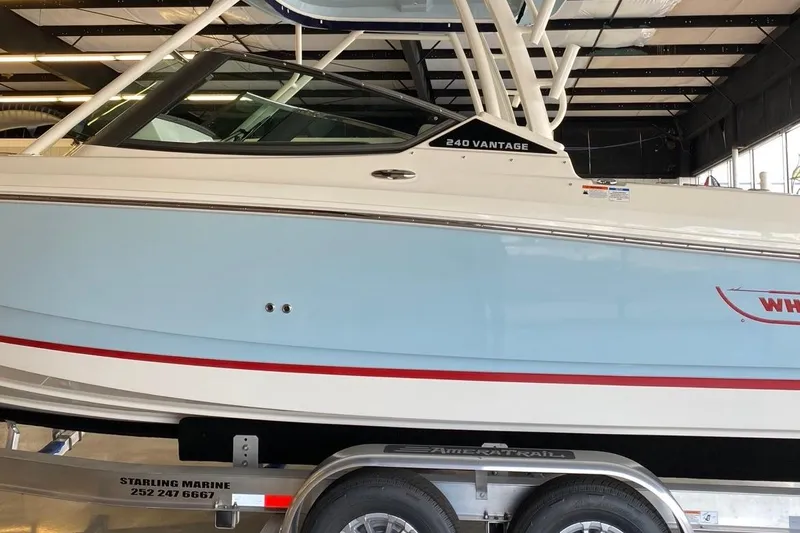 Slide: The Image of 2022 Boston Boatworks Vantage 240 on trailer in indoor showroom. - 5