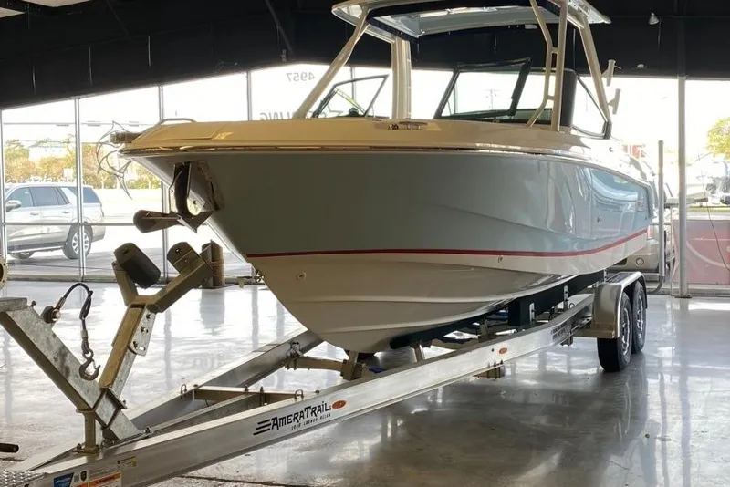 Slide: The Image of 2022 Boston Boatworks Vantage 240 on trailer in showroom. - 6