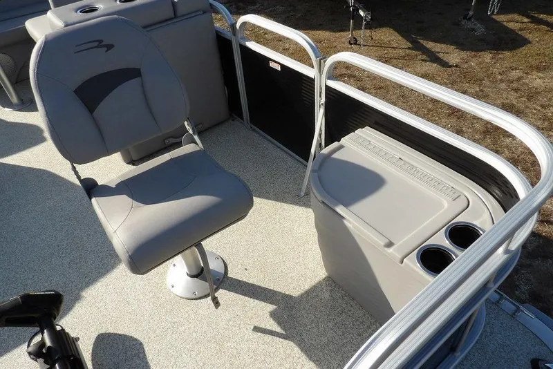 Slide: The Image of 2020 Bennington 20 SFV boat interior with gray seating and storage compartment. - 13