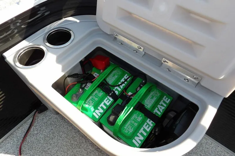 Slide: The Image of Battery compartment of 2020 Bennington 20 SFV boat with dual cup holders. - 14