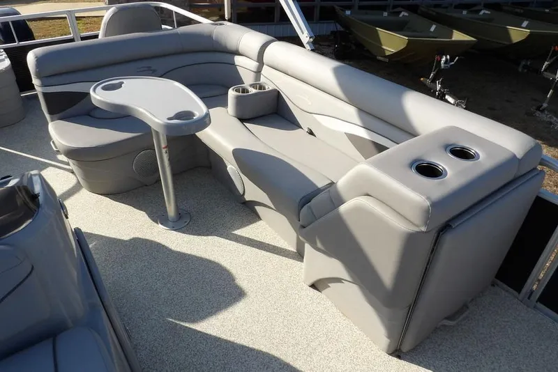 Slide: The Image of 2020 Bennington 20 SFV boat interior with gray seating and cup holders. - 16