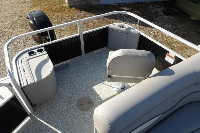 Slide: The Image of 2020 Bennington 20 SFV pontoon boat interior with seating and storage compartments. - 24