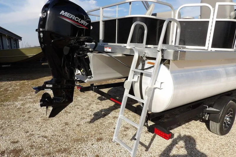 Slide: The Image of 2020 Bennington 20 SFV pontoon boat with Mercury outboard motor and ladder. - 38