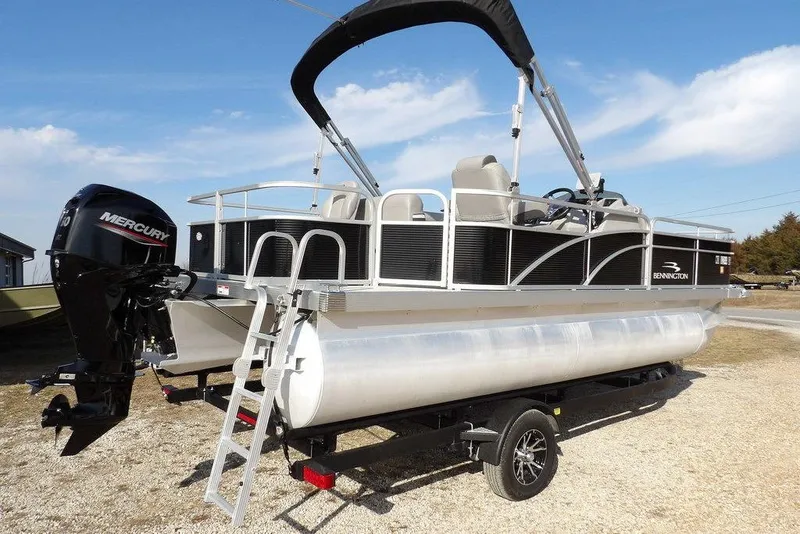 Slide: The Image of 2020 Bennington 20 SFV pontoon boat with Mercury engine on trailer. - 8