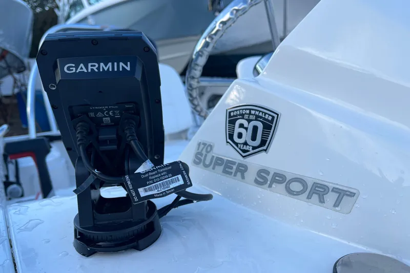 Slide: The Image of 2018 Boston Whaler 170 Super Sport with Garmin device, celebrating 60 years. - 11