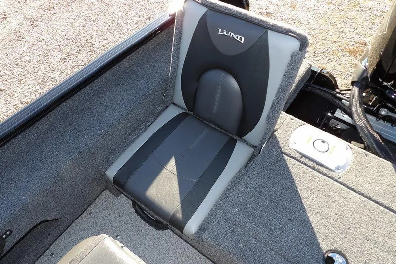 Slide: The Image of 2025 Lund 1775 Adventure SS boat seat with gray upholstery and logo. - 15