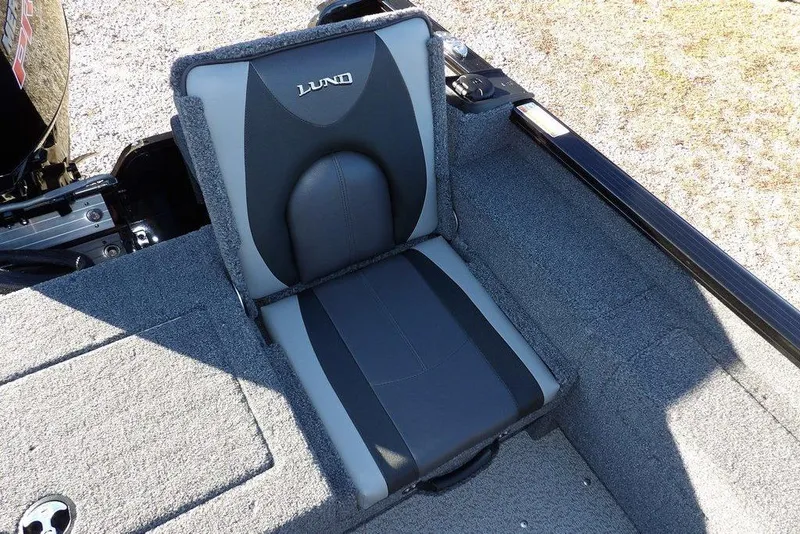 Slide: The Image of 2025 Lund 1775 Adventure SS boat seat with gray and black upholstery. - 16