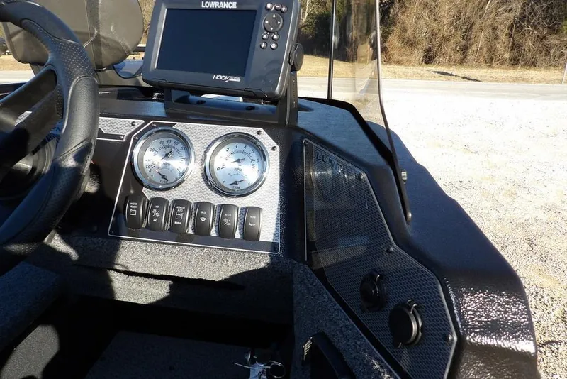 Slide: The Image of Dashboard of 2025 Lund 1775 Adventure SS boat with gauges and Lowrance display. - 26