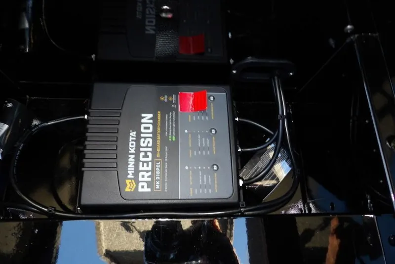 Slide: The Image of Minn Kota Precision charger in 2025 Lund 1775 Adventure SS boat. - 29