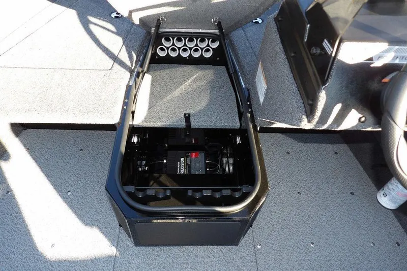 Slide: The Image of 2025 Lund 1775 Adventure SS boat interior with storage compartment and battery setup. - 31
