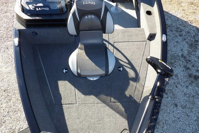 Slide: The Image of 2025 Lund 1775 Adventure SS boat interior with seating and control panel. - 35