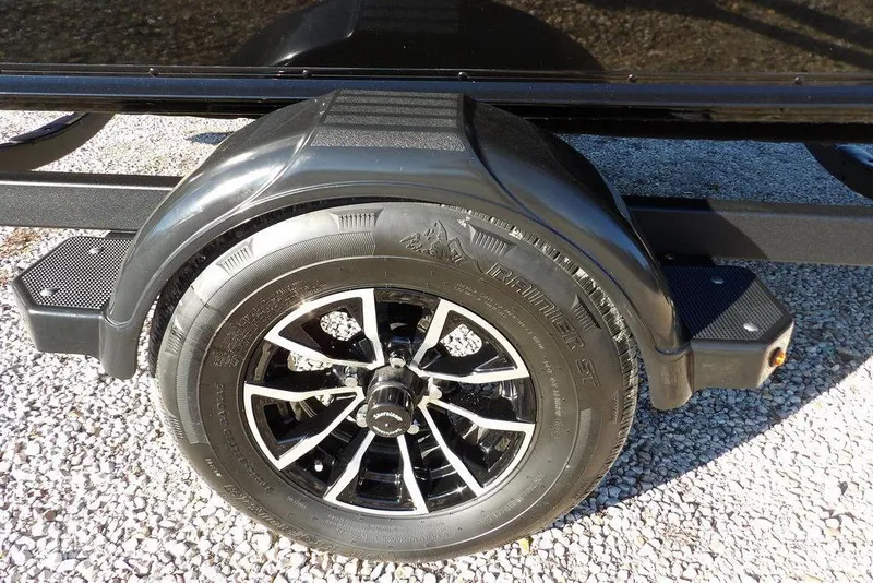 Slide: The Image of Trailer wheel of 2025 Lund 1775 Adventure SS on gravel surface. - 45