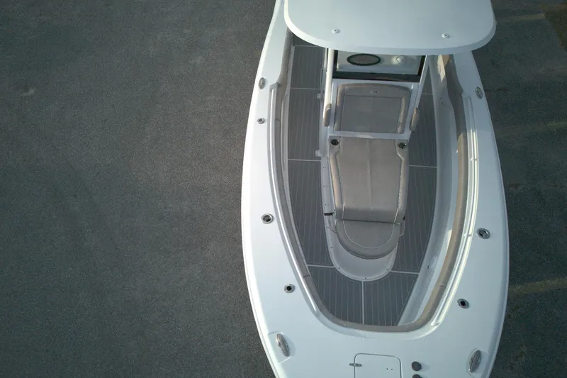 Slide: The Image of 2024 Sea Hunt Gamefish 30 Coffin Box boat, aerial view of deck and seating. - 17