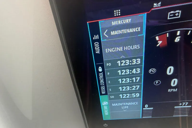 Slide: The Image of 2024 Nor-Tech 500 Sport Center Console engine hours display on Mercury maintenance screen. - 29