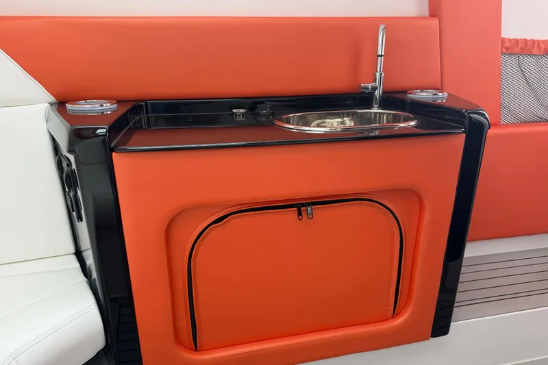 Slide: The Image of 2024 Nor-Tech 500 Sport Center Console with orange sink and storage area. - 39