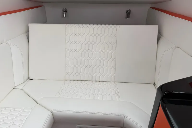 Slide: The Image of 2024 Nor-Tech 500 Sport Center Console interior with white hexagonal-patterned seating. - 42