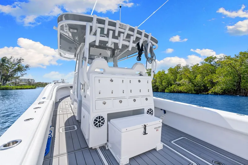 Slide: The Image of 2024 Onslow Bay 37 TE boat on calm water. - 18