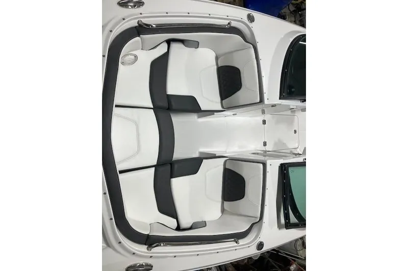 Slide: The Image of 2024 Monterey M-45 boat interior with white and black seating arrangement. - 12