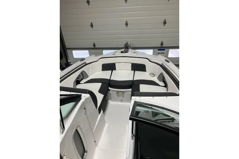 Slide: The Image of 2024 Monterey M-45 boat interior with sleek black and white seating. - 15