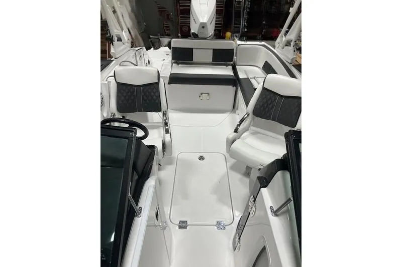 Slide: The Image of 2024 Monterey M-45 boat interior with sleek white seating and modern design. - 5