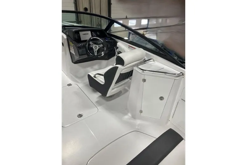 Slide: The Image of 2024 Monterey M-45 boat interior with sleek white seating and modern dashboard. - 6