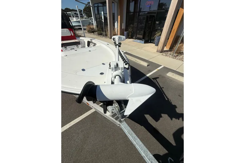 Slide: The Image of 2025 ALK2 Powerboats 17HS on trailer, featuring a mounted trolling motor. - 5