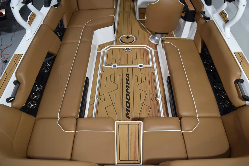 Slide: The Image of Luxurious interior of 2026 Moomba Tykon boat with tan seating and stylish flooring. - 14