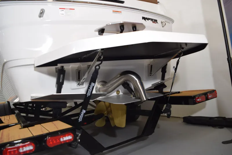 Slide: The Image of 2026 Moomba Tykon boat rear view, showcasing propeller and exhaust system. - 6