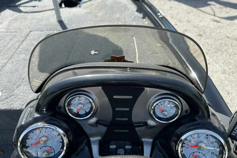 Slide: The Image of Dashboard of 2018 Tracker Pro Team 175 TXW boat with gauges and windshield. - 14