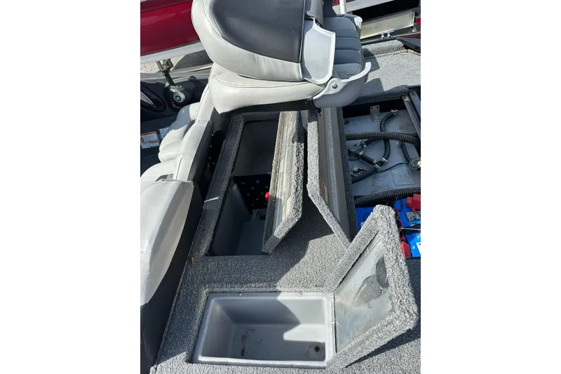 Slide: The Image of 2018 Tracker Pro Team 175 TXW boat interior storage compartments open. - 19