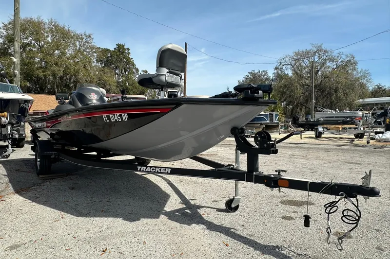 Slide: The Image of 2018 Tracker Pro Team 175 TXW boat on trailer in outdoor setting. - 20