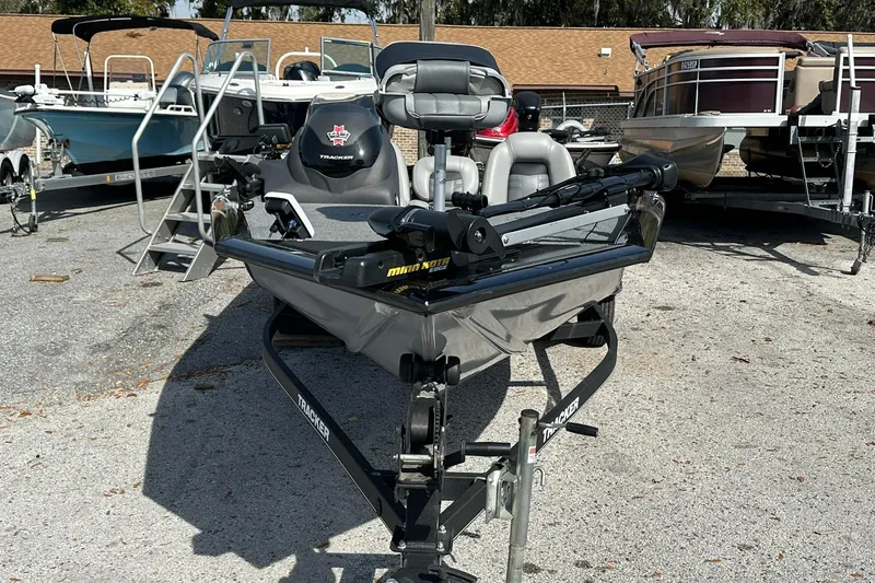 Slide: The Image of 2018 Tracker Pro Team 175 TXW fishing boat on trailer, parked outdoors. - 3