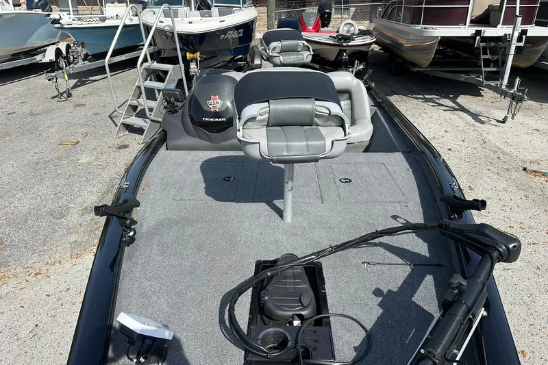 Slide: The Image of 2018 Tracker Pro Team 175 TXW fishing boat with seating and equipment on display. - 4
