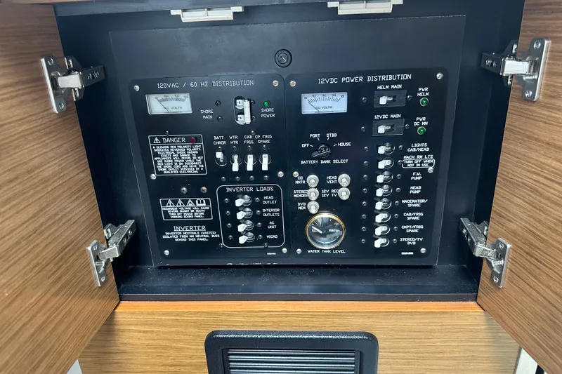 Slide: The Image of Electrical control panel on a 2019 Cruisers Yachts 338 Outboard boat. - 19